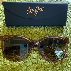 Brand new never used Maui Jim ladies sunglasses. New with the box and case!